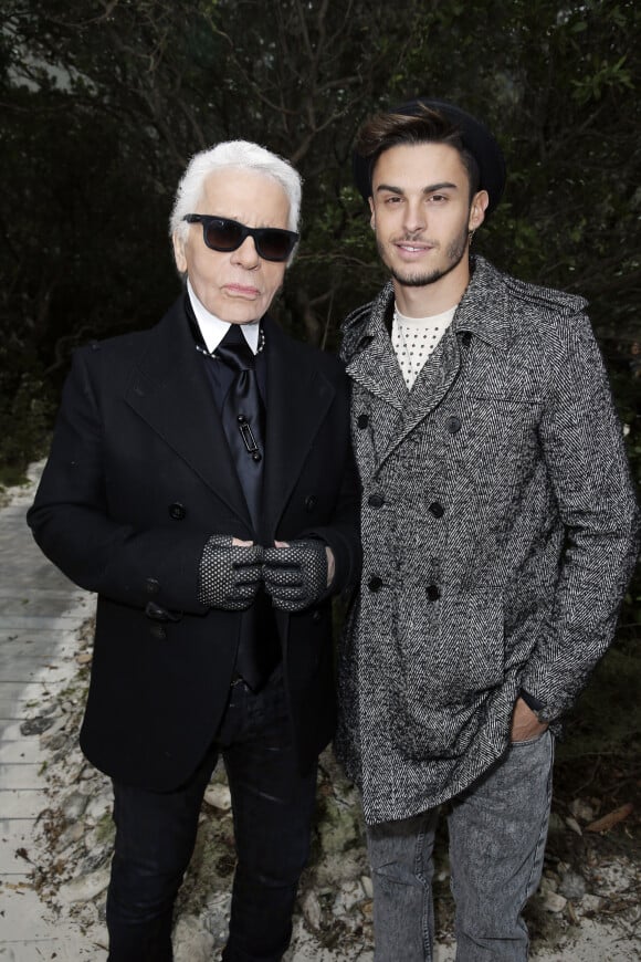 Karl Lagerfeld et Baptiste Giabiconi - People au defile de mode Chanel haute-couture printemps ete 2013 au Grand Palais a Paris. Le 22 janvier 2013