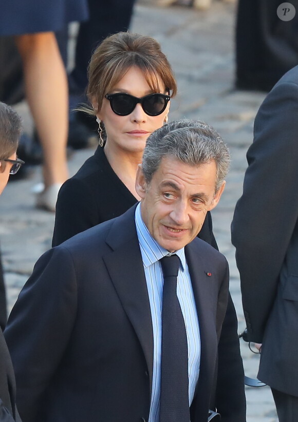 Carla Bruni Sarkozy et Nicolas Sarkozy - Arrivées à l'hommage national à Charles Aznavour à l'Hôtel des Invalides à Paris. Le 5 octobre 2018 © Jacovides-Moreau / Bestimage