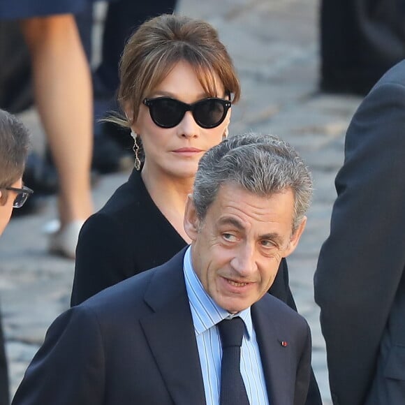 Carla Bruni Sarkozy et Nicolas Sarkozy - Arrivées à l'hommage national à Charles Aznavour à l'Hôtel des Invalides à Paris. Le 5 octobre 2018 © Jacovides-Moreau / Bestimage