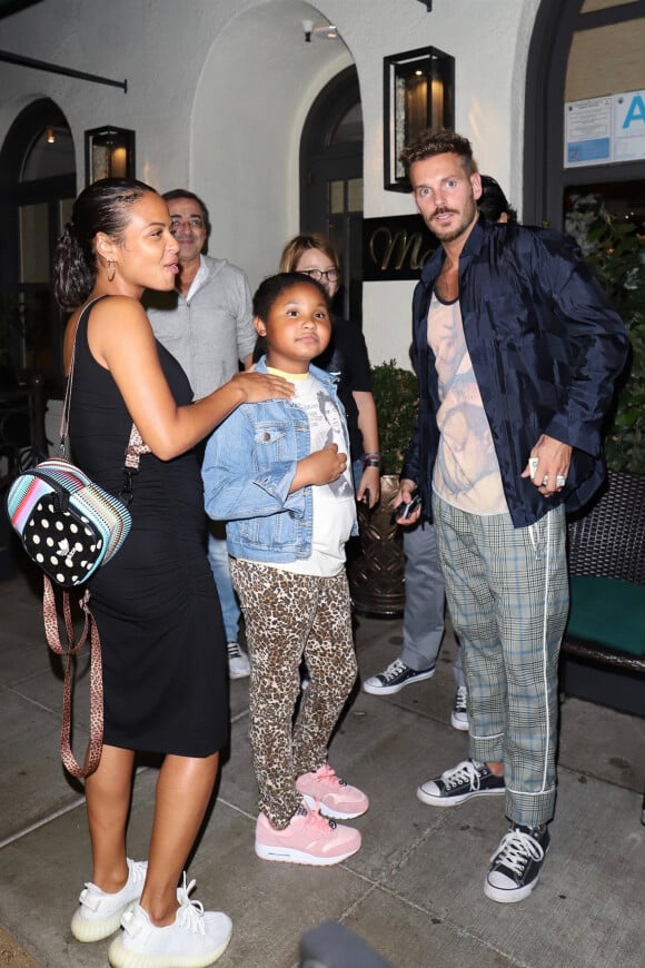 Christina Milian, enceinte, son compagnon Matt Pokora et sa fille Violet Madison sont allés dîner dans le restaurant Madeo à Beverly Hills, le 8 août 2019.