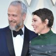 Olivia Colman et son mari Ed Sinclair - Photocall des arrivées de la 91e cérémonie des Oscars 2019 au théâtre Dolby à Hollywood, Los Angeles. Le 24 février 2019.