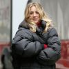 Exclusive - Actress Kaley Cuoco is seen wearing a puffer coat and slides with a her name tag walking to the set of 'The Flight Attendant' filming in Midtown, New York City, NY, USA on December 16, 2019. Photo by Christopher Peterson/Splash News/ABACAPRESS.COM 