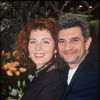 Archives - Véronique Genest et son mari, marraine de la boutique "Fleurs de Paris". Le 25 novembre 1994.