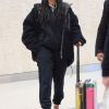 Exclusif - Rihanna arrive à l'aéroport JFK de New York avec une valise transparente, le 16 janvier 2020.
