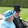 La reine Elizabeth d'Angleterre, le prince Philip, duc d'Edimbourg, le prince Harry aux courses Royal Ascot à Berkshire le 19 juin 2014.