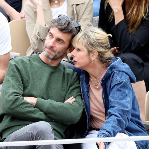 Exclusif - Karin Viard et Manuel Herrero - Célébrités dans les tribunes des internationaux de France de tennis de Roland Garros à Paris, France, le 9 juin 2019. © Jacovides-Moreau/Bestimage