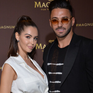 Nabilla Benattia (enceinte) et son mari Thomas Vergara au photocall de l'after party "Magnum x Rita Ora" sur la plage privée Magnum lors du 72ème Festival International du Film de Cannes, France,le 16 mai 2019. © Veeren/Bestimage