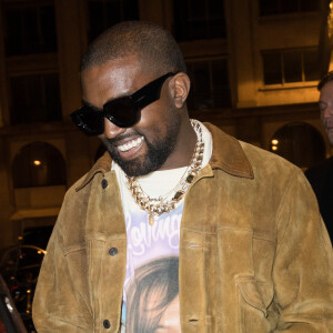 Kanye West, Kim Kardashian, North West, Penelope Disick quittent le restaurant "Le Piaf" ou avait lieu l'after party de la 8ème collection Yeezy à Paris le 2 mars 2020