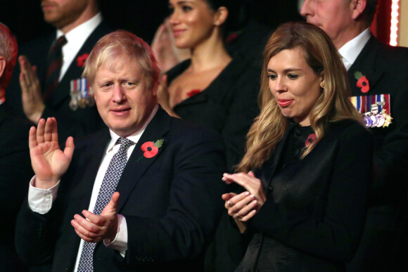 Boris Johnson, Premier ministre britannique, et sa compagne Carrie Symonds au Royal British Legion Festival of Remembrance au Royal Albert Hall à Kensington, Londres, le 9 novembre 2019.