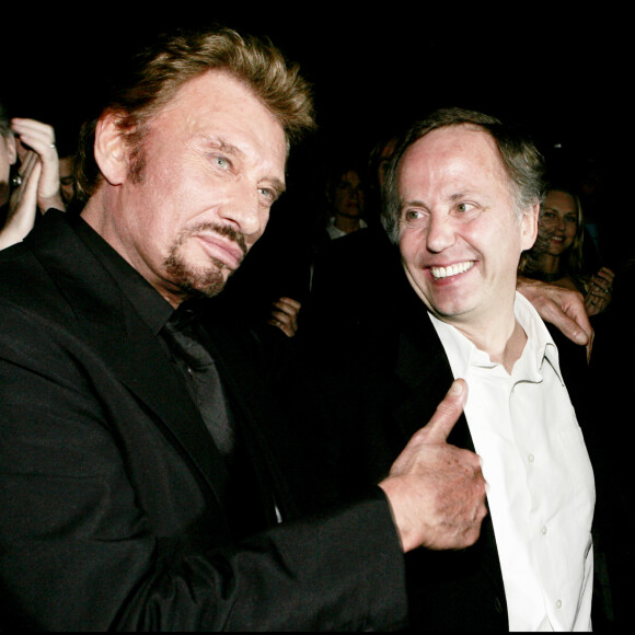 Johnny Hallyday et Fabrice Luchini, le réalisateur Laurent Tuel - Première du film "Jean-Philippe" à Paris en 2006.