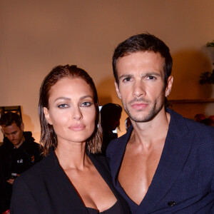 Exclusif - Caroline Receveur et son compagnon Hugo Philip - Les people dans l'espace Experience Immersive réservé aux VIP lors du Etam Live Show 2019 au Stade Roland Garros lors de la fashion week à Paris, le 24 septembre 2019. © Rachid Bellak/Bestimage