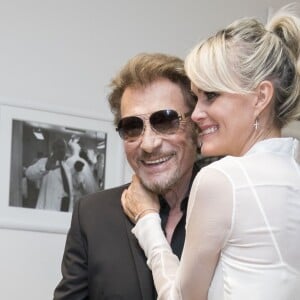 Johnny Hallyday et sa femme Laeticia Hallyday - People au défilé de mode Haute-Couture automne-hiver 2016/2017 "Christian Dior" à Paris. Le 4 juillet 2016 © Olivier Borde / Bestimage