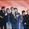 Jean-Jacques Goldman, Michael Jones, Claude Le Péron (derrière JGG) aux Victoires de la Musique en 1987 à Paris