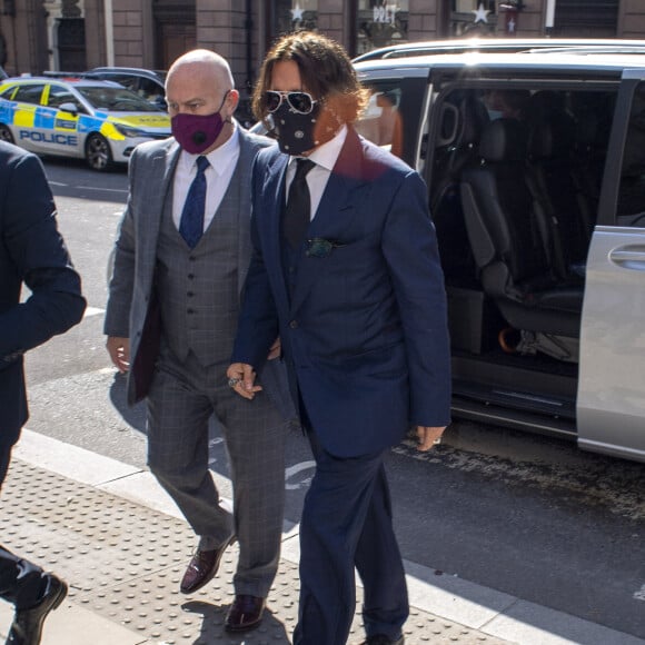 Johnny Depp arrive à la cour royale de justice à Londres, pour entamer le procès pour diffamation contre le magazine The Sun Newspaper. Le 7 juillet 2020