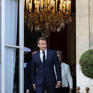 Le président français Emmanuel Macron accompagné de la première dame, Brigitte Macron, lors de son discours aux armées, à l'hôtel de Brienne, Paris, France, le 13 juillet 2020. © Stéphane Lemouton / Bestimage