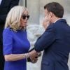 Le président français Emmanuel Macron accompagné de la première dame, Brigitte Macron, lors de son discours aux armées, à l'hôtel de Brienne, Paris, France, le 13 juillet 2020. © Stéphane Lemouton / Bestimage