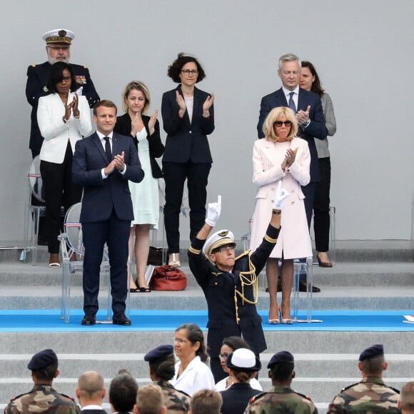 Le président Emmanuel Macron, la première dame Brigitte Macron, Elisabeth Moreno, ministre déléguée en charge de l'égalité entre les femmes et les hommes, de la diversité et de l'égalité des chances, Barbara Pompili, ministre de la transition écologique, Bruno Le Maire, ministre de l'économie et des finances et de la relance lors de la cérémonie du 14 juillet à Paris le 14 juillet 2020. © Stéphane Lemouton / Bestimage