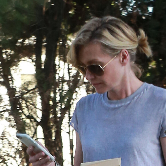 Exclusif - Ellen DeGeneres et sa femme Portia de Rossi se rendent à l'hôpital Cedars Sinai avant d'aller dîner à West Hollywood, le 25 mars 2015.