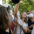 Exclusif - Le président Emmanuel Macron, masqué, prend un bain de foule à Bormes-les-Mimosas le 3 aout 2020. Il a ensuite pris un pot avec François Arizzi, le maire de la commune. © Jacovides/Moreau/Bestimage