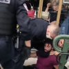 Ademo (PNL) se fait violemment arrêter par quatre policiers à Paris. L'artiste français a été placé en garde à vue au commissariat du XIVe pour "usage de stupéfiants", "outrage" et "rébellion".