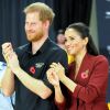 Le prince Harry, duc de Sussex, et Meghan Markle, duchesse de Sussex, enceinte, assistent à la finale de basketball en fauteuil roulant aux Invictus Games 2018 à Sydney.