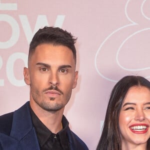 Baptiste Giabiconi et Léa Elui - Photocall du défilé Etam Live Show 2020 à Paris le 29 septembre 2020. © Pool Agence Bestimage