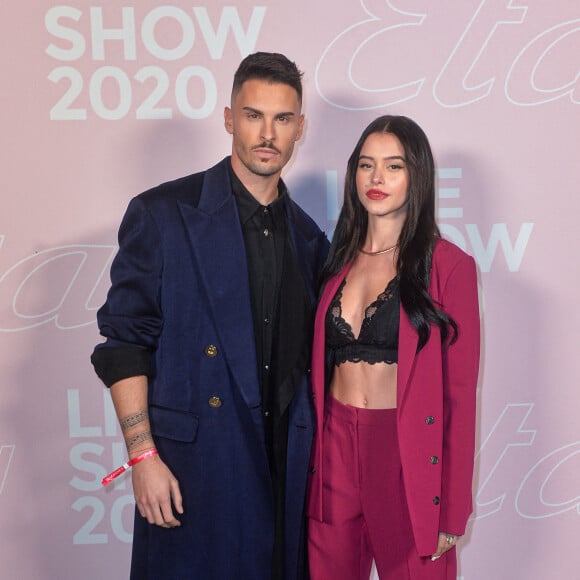 Baptiste Giabiconi et Léa Elui - Photocall du défilé Etam Live Show 2020 à Paris le 29 septembre 2020. © Pool Agence Bestimage