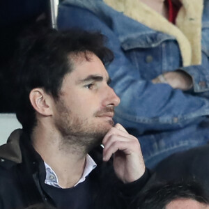 Jean-Luc Reichmann et sa femme Nathalie dans les tribunes du match de football de Ligue 1 PSG - Monaco au Parc des Princes à Paris, le 15 avril 2018.