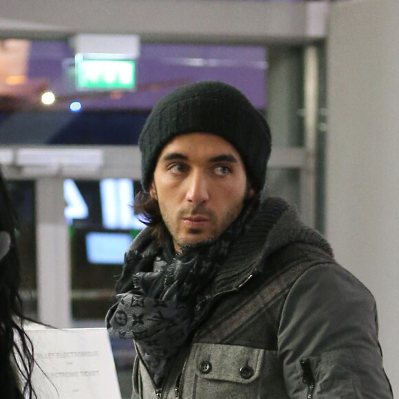 Nabilla et Thomas a l'aeroport de Roissy le 13 janvier 2013 . Ils vont participer la saison 5 des Anges de la Tele-Realite a Miami