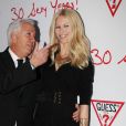 Paul Marciano et Claudia Schiffer- 30e anniversaire de Guess à l'hôtel Geroge V à Paris, le 3 mai 2012.