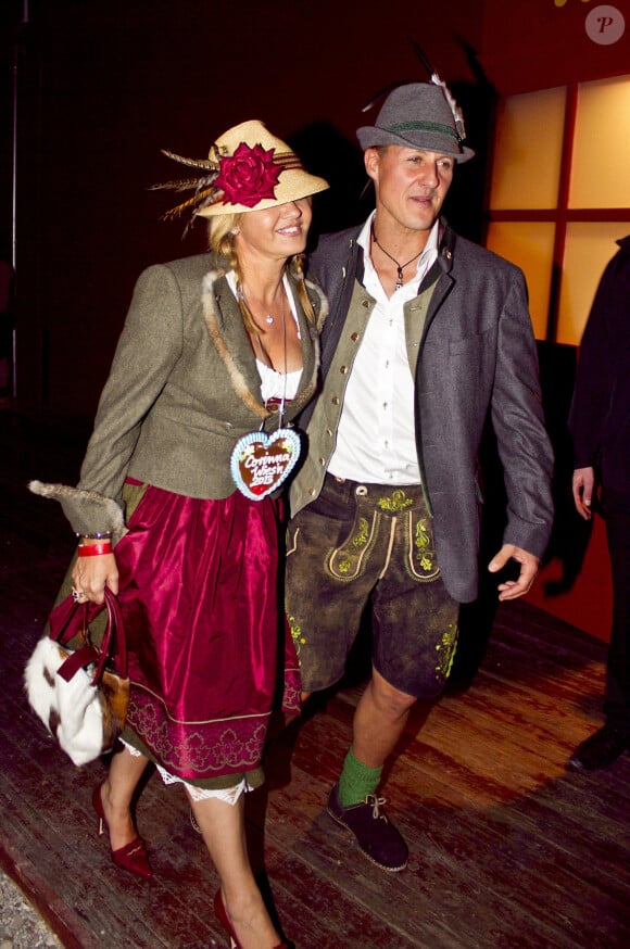 Michael Schumacher et sa femme Corinna lors de la soiree Oktoberfest a Munich le 1er octobre 2013.