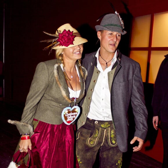 Michael Schumacher et sa femme Corinna lors de la soiree Oktoberfest a Munich le 1er octobre 2013.