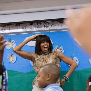 Michelle Obama avec des enfants en mai 2013