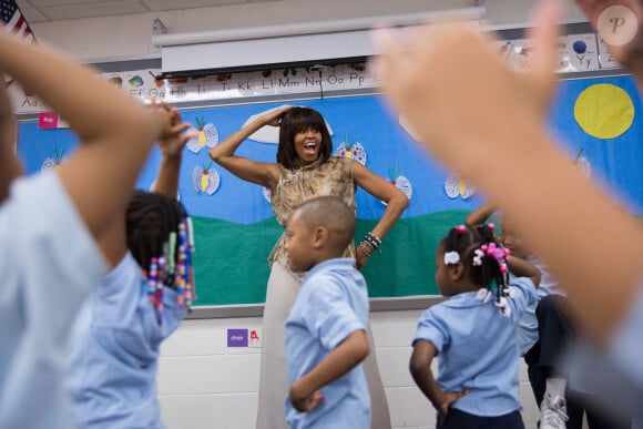 Michelle Obama avec des enfants en mai 2013