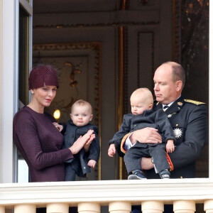 La princesse Charlène, sa fille la princesse Gabriella, le prince Albert II de Monaco et son fils le prince Jacques - La famille princière de Monaco au balcon du palais lors de la Fête Nationale monégasque le 19 novembre 2015. © Dominique Jacovides / Bruno Bébert / Bestimage