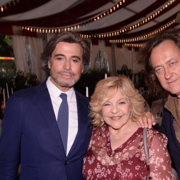 Exclusif - Alexandre Zouari, Nicoletta et son mari Jean-Christophe Molinier - Dîner de gala suivi d'une vente aux enchères privée au profit de l'association "The children for peace" dans les jardins des Tuileries à Paris le 25 juin 2019. © Rachid Bellak/Bestimage 