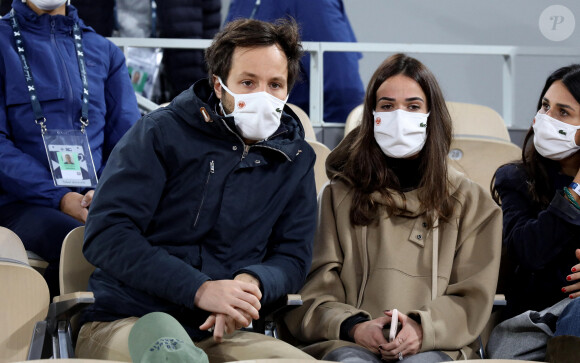 Vianney Bureau et sa compagne Catherine Robert en tribune lors des internationaux de tennis de Roland Garros à Paris le 4 octobre 2020. © Dominique Jacovides / Bestimage