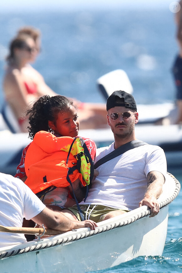 Matt Pokora et sa compagne Christina Milian et leur fils Isaiah sont allés déjeuner avec des amis au restaurant de plage Le Layet au Lavandou le 20 juillet 2020. 