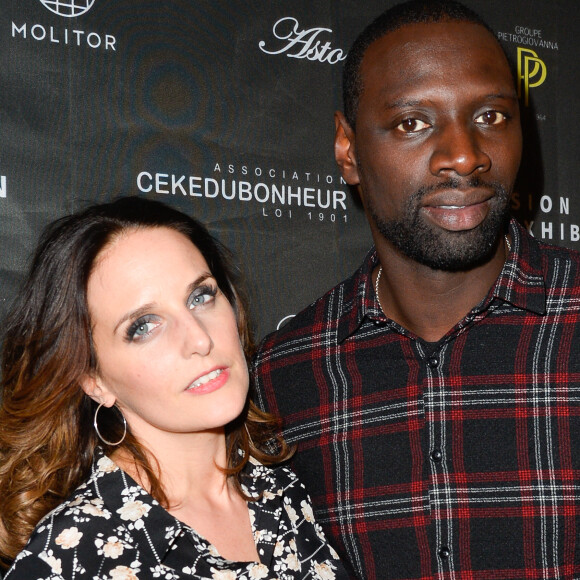 Info ( Omar Sy bientôt papa pour la 5 ème fois, sa femme Hélène est enceinte) - Omar Sy et sa femme Hélène au vernissage de l'exposition "Vision by AG", au profit de l'association caritative CeKeDuBonheur, à la Piscine Molitor à Paris, le 30 novembre 2016. © Guirec Coadic/Bestimage 