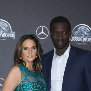Omar Sy et sa femme Hélène Sy (boucles d'oreilles Messika) - Première du film "Jurassic World" à l'Ugc Normandie à Paris le 29 mai 2015. 