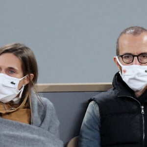 Maurici Calogero et sa compagne Marie Bastide en tribune lors de la finale homme des internationaux de tennis de Roland Garros à Paris remportée par Rafael Nadal en trois set le 11 octobre 2020. © Dominique Jacovides / Bestimage