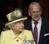 La reine Elisabeth II d'Angleterre et le prince Philip, duc d'Edimbourg sortent de la messe des jeux du Commonwealth à l'Abbaye de Westminster à Londres, Royaume Uni
