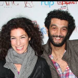 Anne Depétrini et Ramzy en soirée à Paris en 2009.