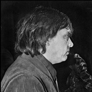 David Bailey et Catherine Deneuve au défilé Yves Saint Laurent en 1983.