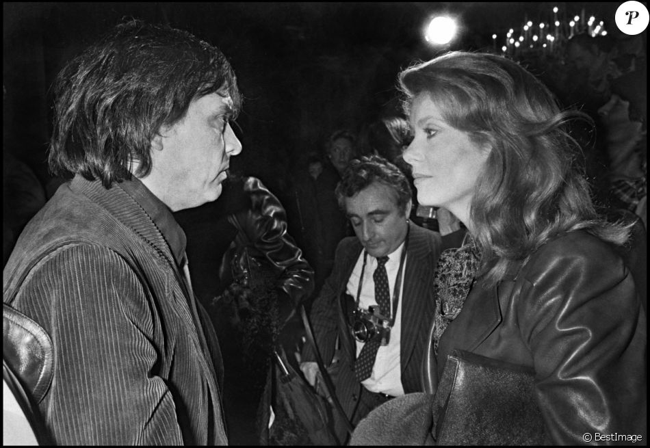 David Bailey et Catherine Deneuve au défilé Yves Saint Laurent en 1983.