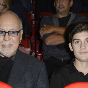 René Angélil et son fils René-Charles au concert de Céline Dion au POPB de Paris, le 5 décembre 2013. 