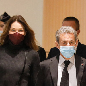 1er jour des plaidoiries de la défense - Nicolas Sarkozy arrive avec sa femme Carla Bruni Sarkozy procès des "écoutes téléphoniques" ( affaire Bismuth) au tribunal de Paris le 9 décembre 2020. © Christophe Clovis / Bestimage 