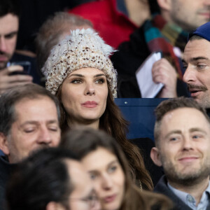 Camille Lacourt et sa compagne Alice Detollenaere (Miss Bourgogne 2010) dans les tribunes lors du match de championnat de Ligue 1 Conforama opposant le Paris Saint-Germain (PSG) aux Girondins de Bordeaux au Parc des Princes à Paris, France, le 23 février 2020. Le PSG a gagné 4-3. © Cyril Moreau/Bestimage