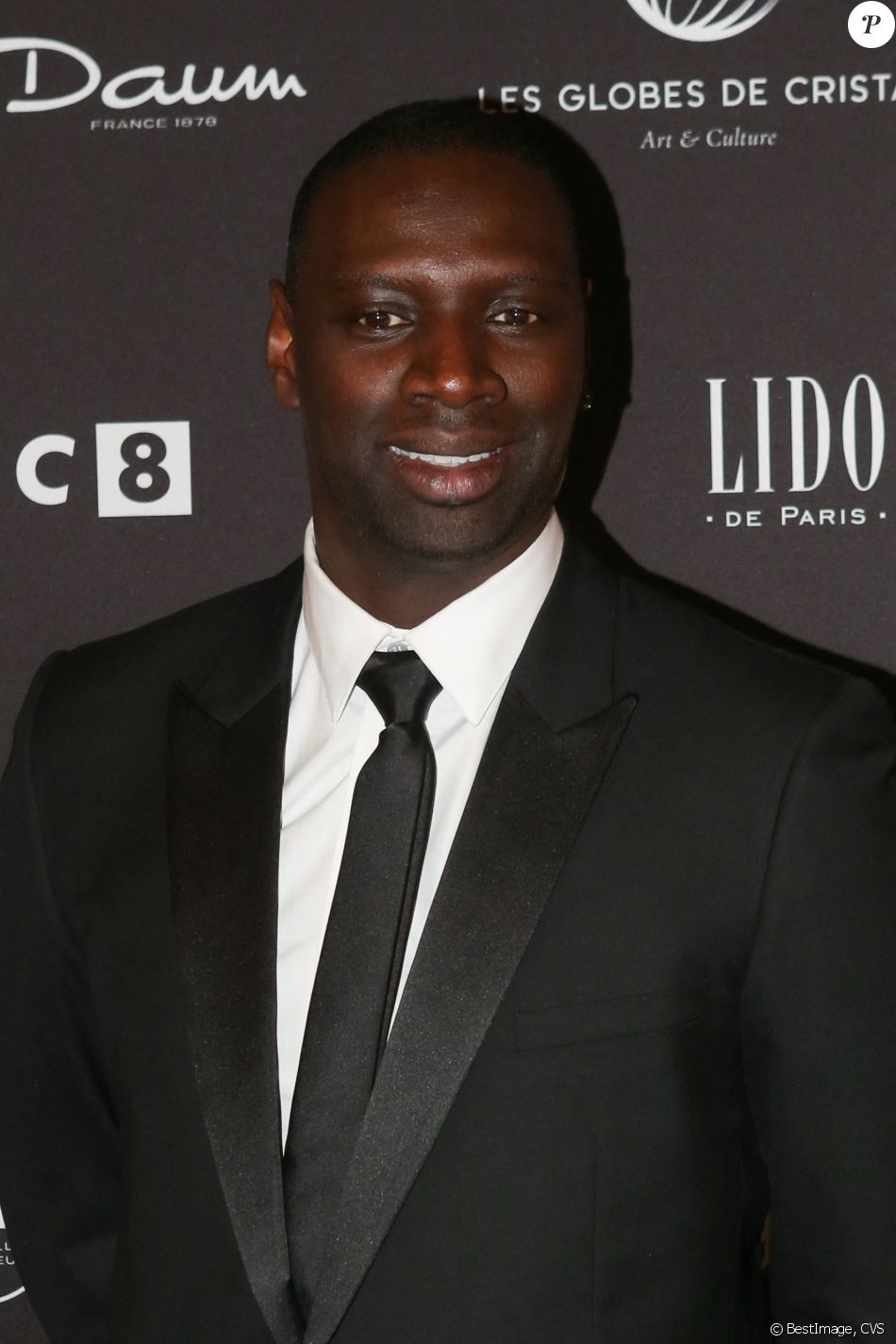 Omar Sy au photocall de la 11ème cérémonie des Globes de Cristal au Lido à Paris le 30 janvier 2017. © CVS / Bestimage