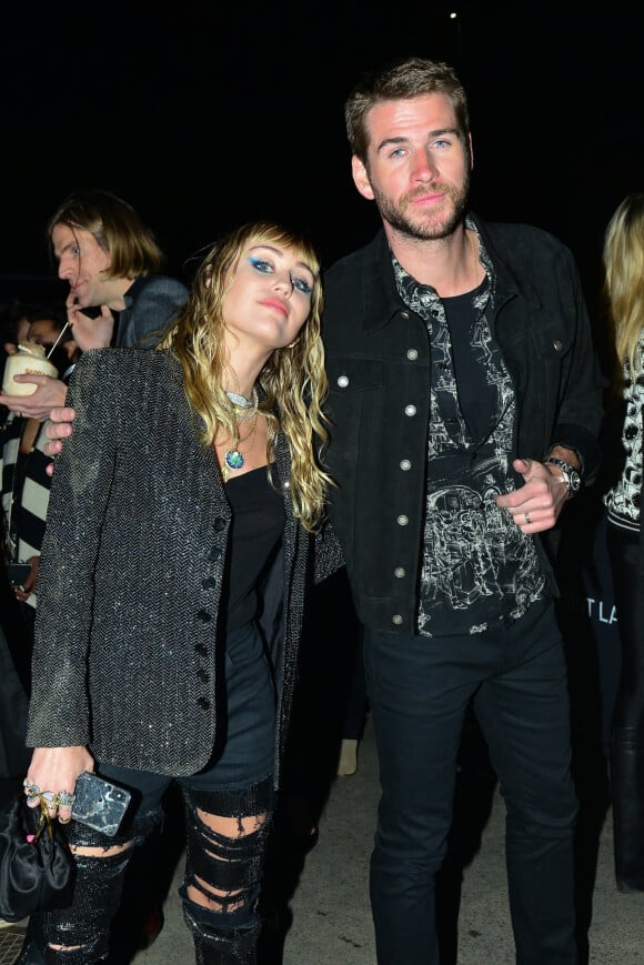 Miley Cyrus et son mari Liam Hemsworth ont été aperçus à la sortie du défilé Saint Laurent à Malibu, le 6 juin 2019. 